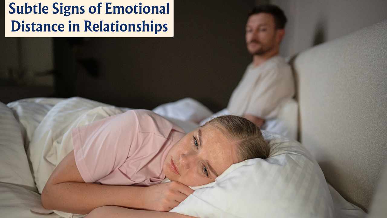 Couple sitting quietly apart showing subtle emotional distance in a relationship
